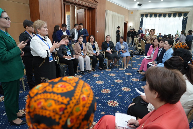 a group of people in a room