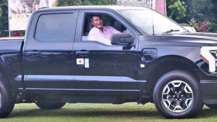 Samoa's Minister of Natural Resources and Environment, Toeolesulusulu Cedric Schuster proudly takes one of the Electric Vehicles for a test drive. Photos by:Taunuuga Toatasi.
