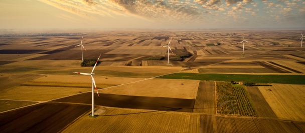 Expansive view of landscape with windmills