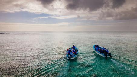 a small boat in a body of water